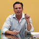 Ray Swartz, a prominent slicked-back-hair man.